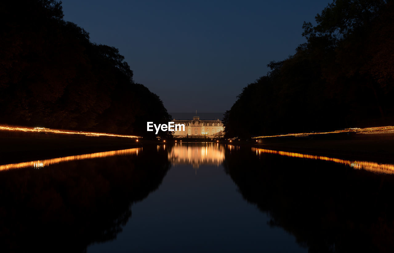 SCENIC VIEW OF LAKE AT NIGHT