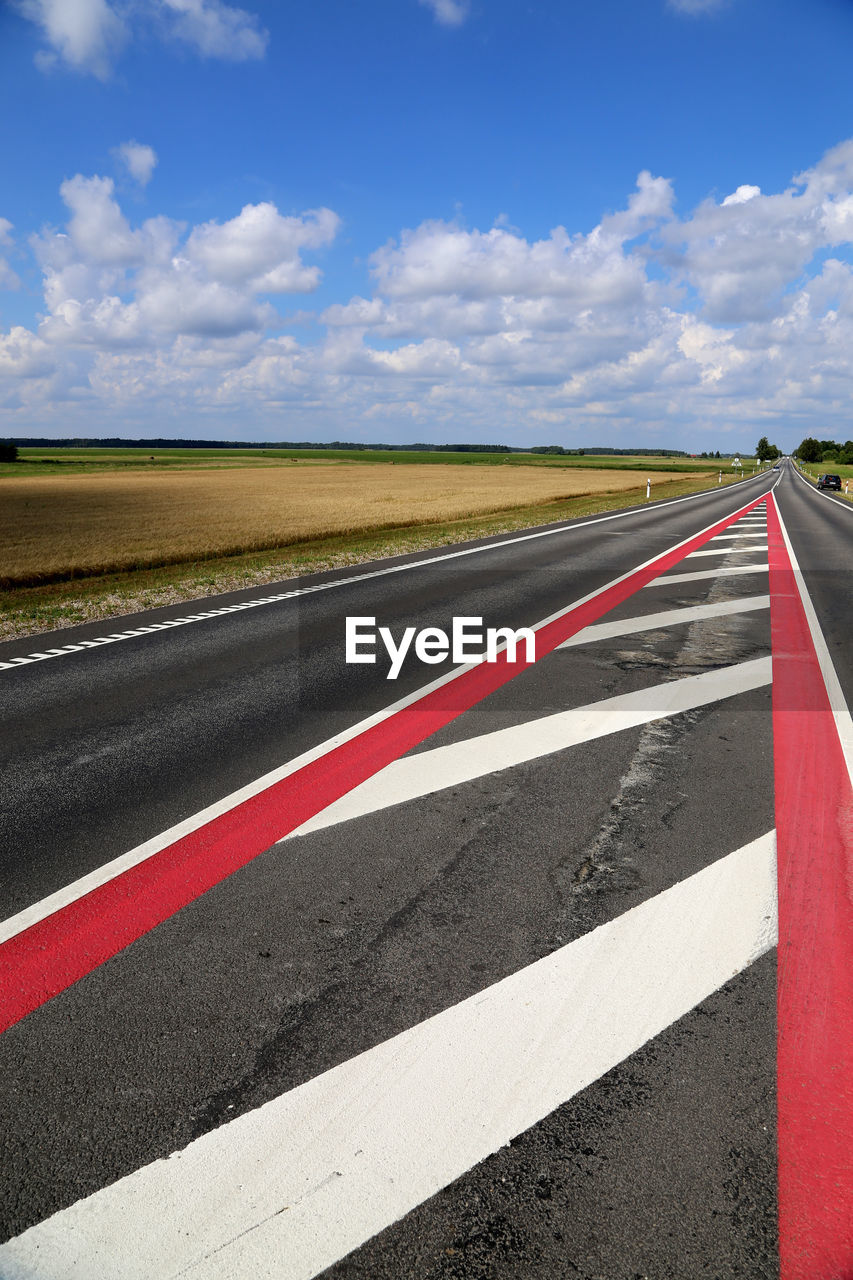 Surface level of road along countryside landscape