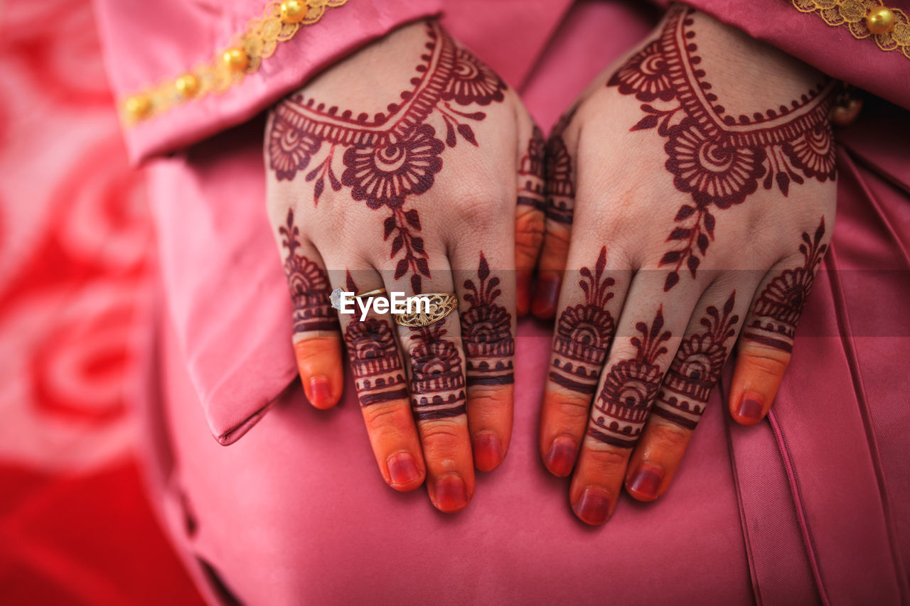 Henna is traditional malay decorative art. close-up.