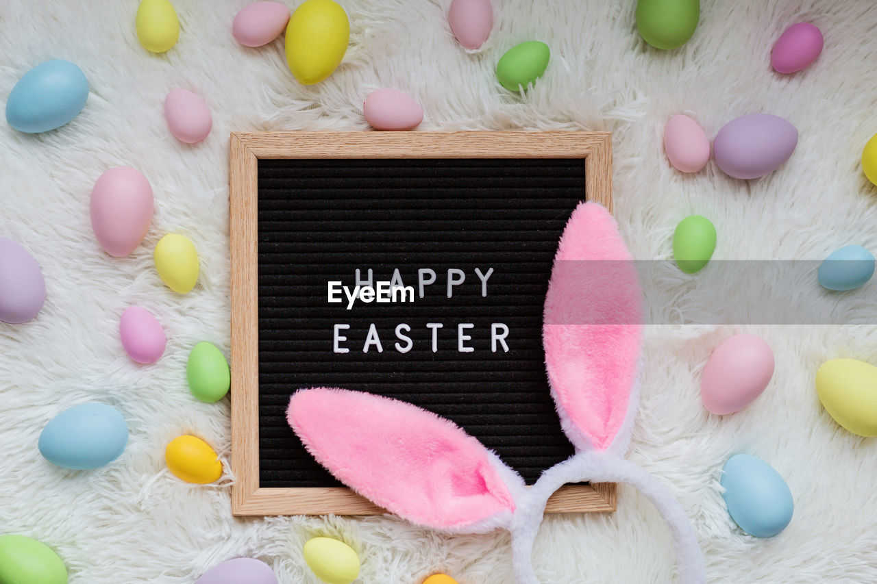 high angle view of easter eggs on blackboard