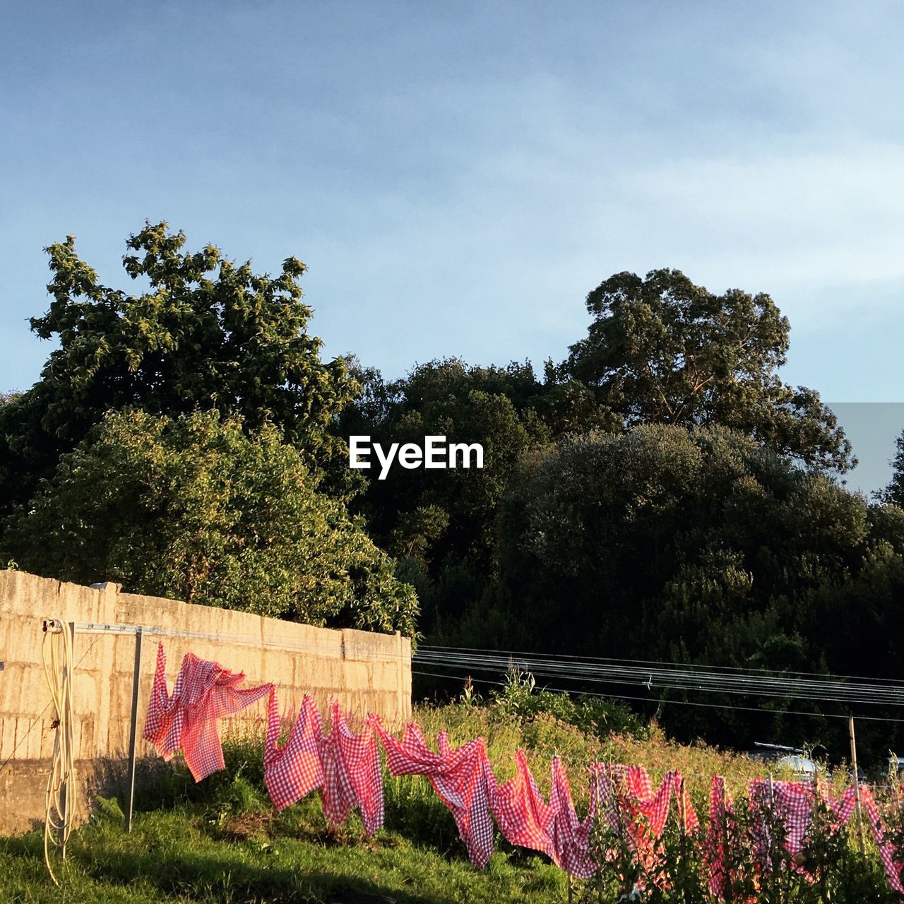 CLOTHES DRYING AGAINST SKY