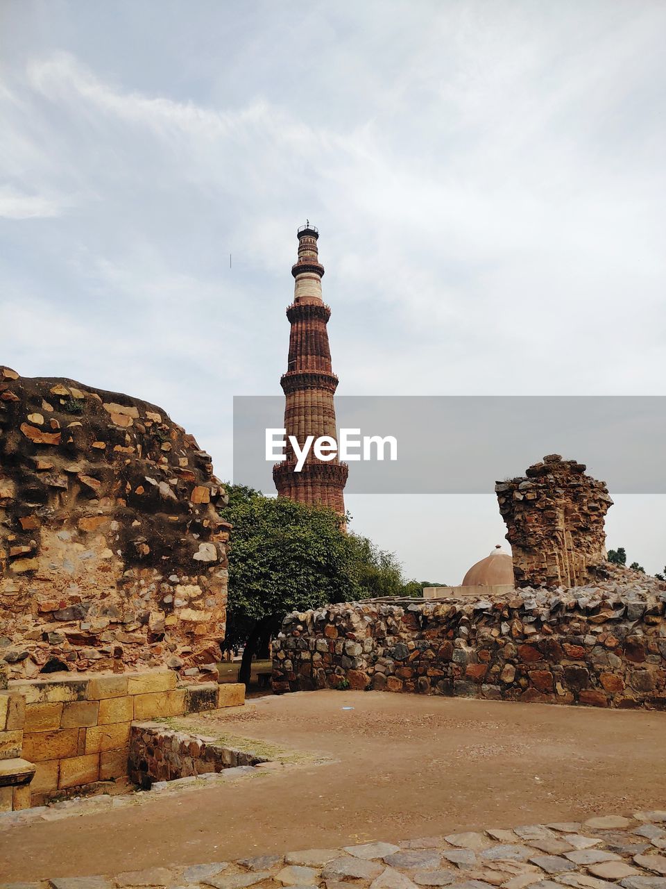 architecture, history, travel destinations, the past, ancient history, temple, built structure, rock, travel, ancient, landmark, ruins, sky, temple - building, religion, tower, nature, building exterior, historic site, tourism, building, cloud, no people, brick, archaeological site, belief, old ruin, wall, outdoors, industry, environment, old, place of worship, fortification, city, spirituality, ancient civilization, monument, business finance and industry, landscape, stone material