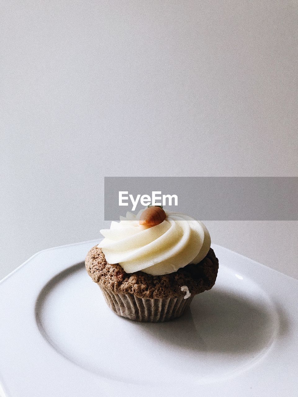 High angle view of carrot cupcakes on plate