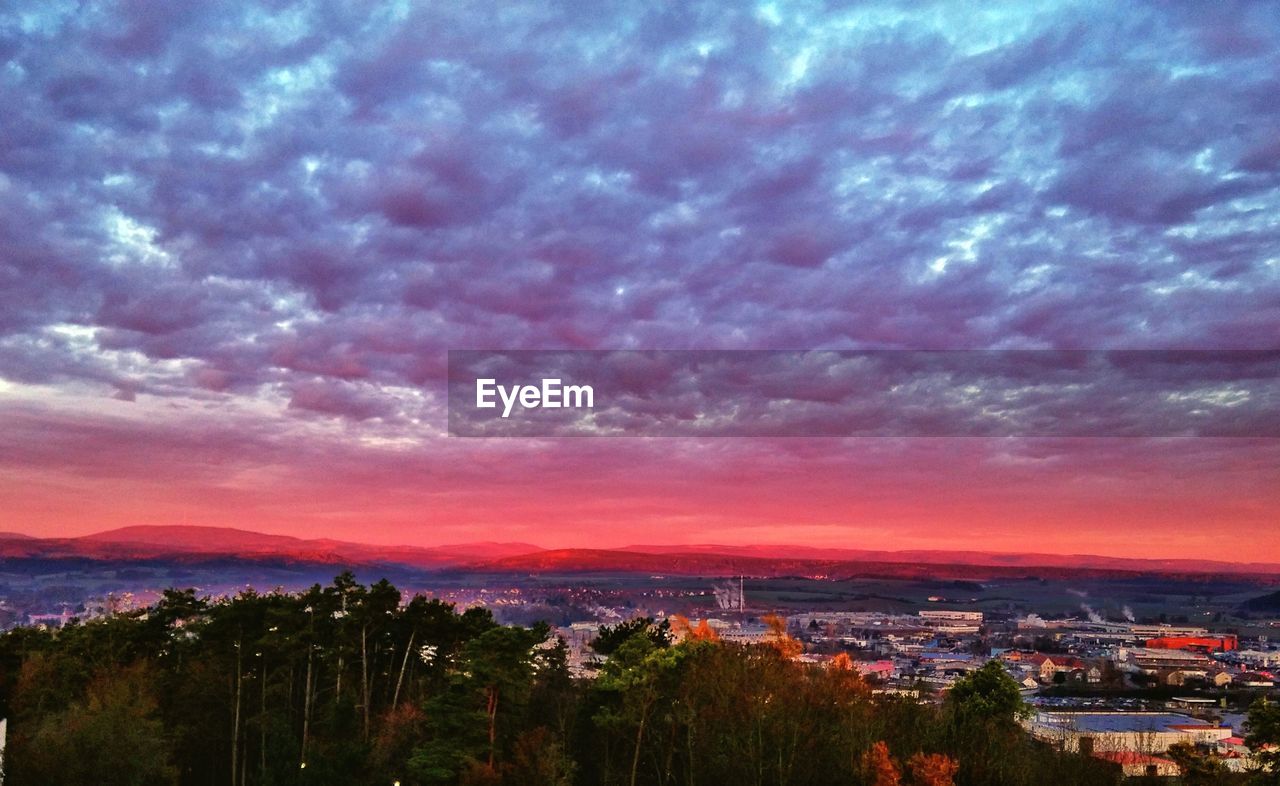 AERIAL VIEW OF CITYSCAPE AT NIGHT