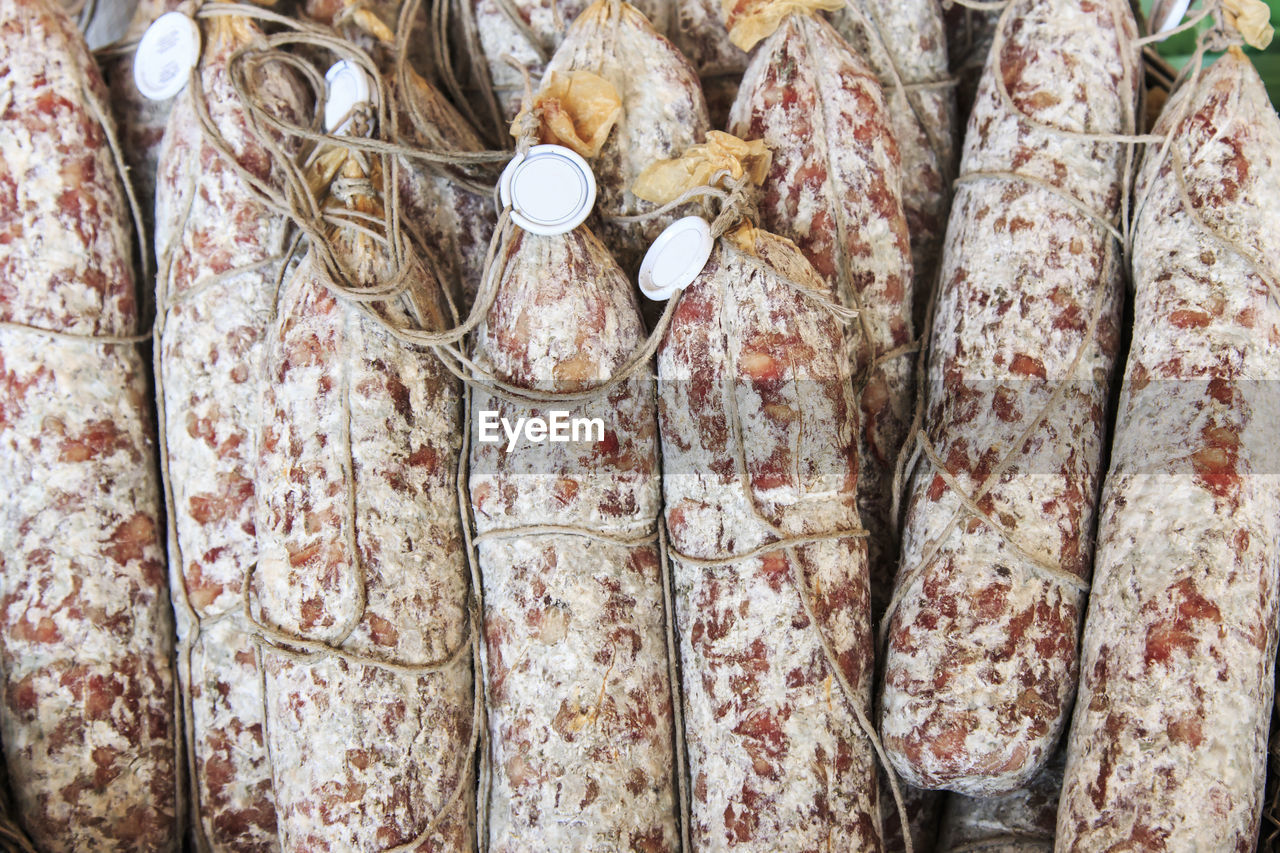 High angle view of salami at market for sale