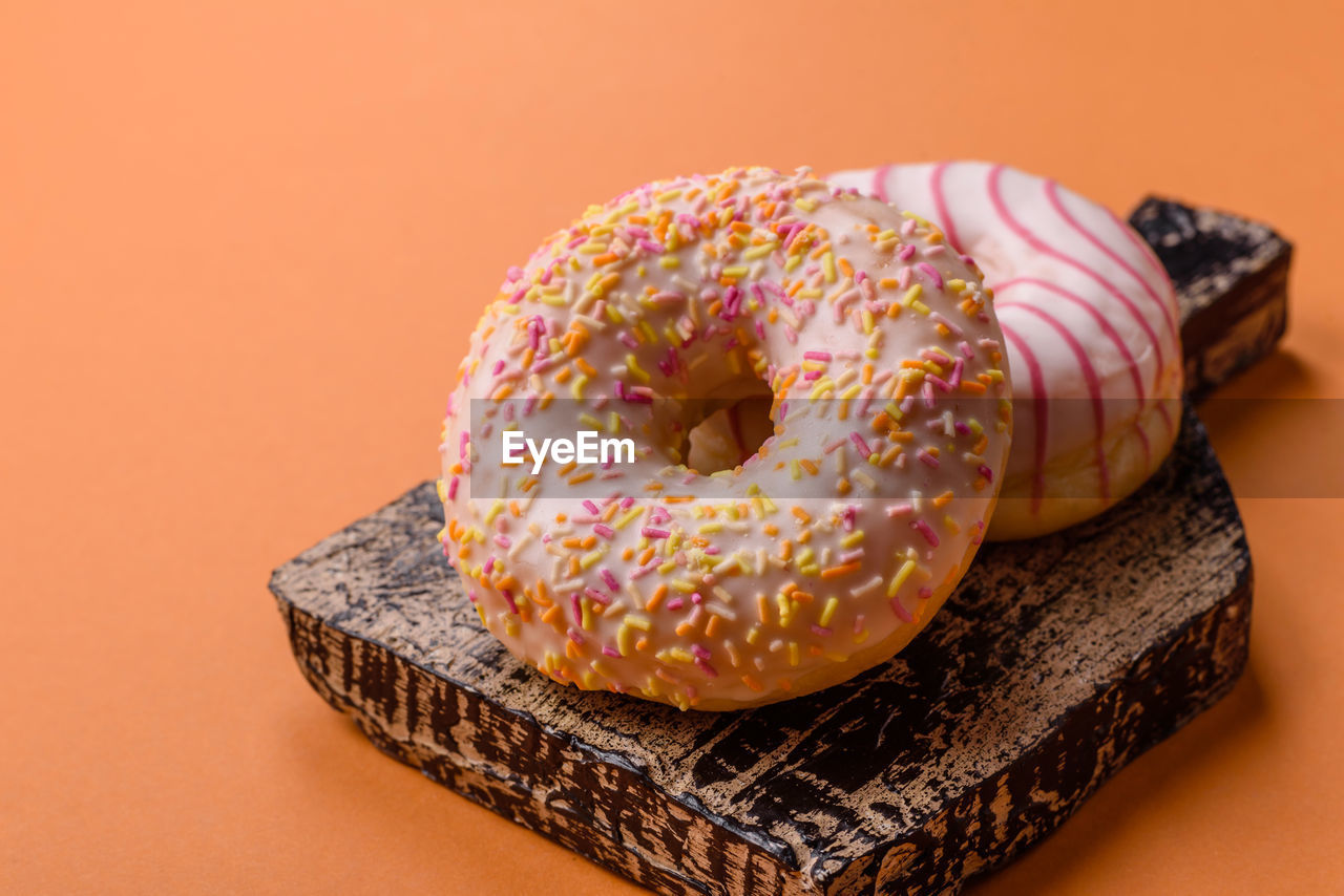 high angle view of donut on yellow background
