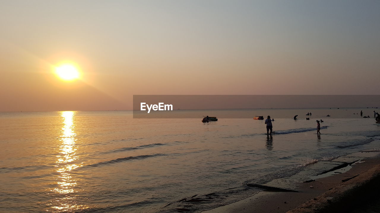 SCENIC VIEW OF SEA DURING SUNSET