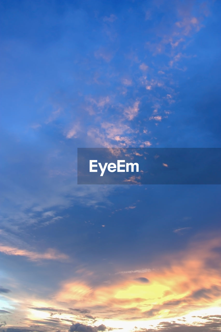 Low angle view of clouds in sky during sunset