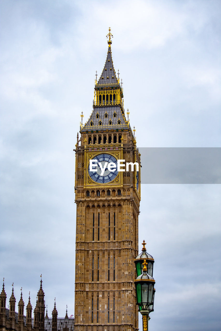 Low angle view of big ben against sky