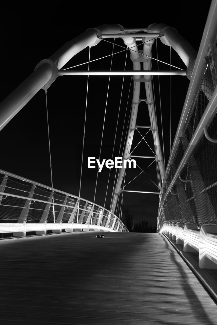 View of suspension bridge at night