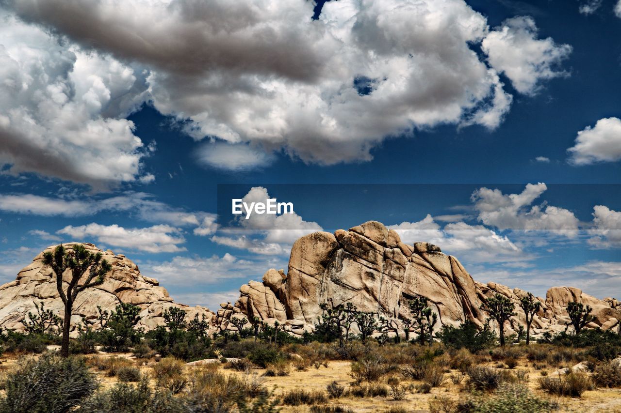 Scenic view of rocky mountains against sky