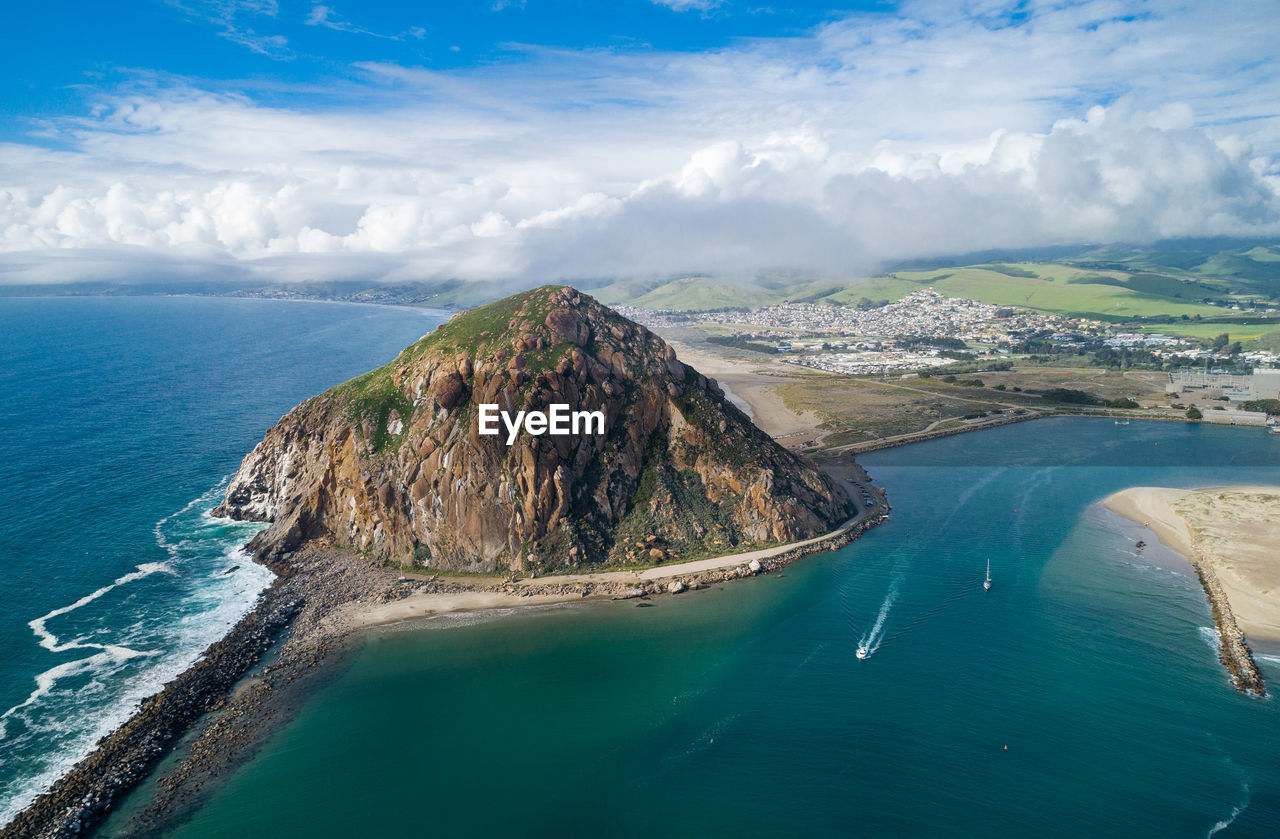 Morro rock in morro bay. ancient volcanic mound at the end of morro rock beach