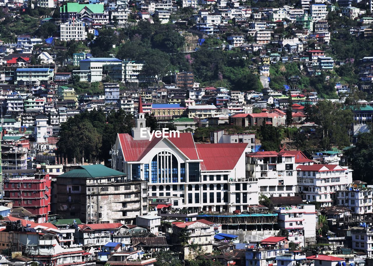 Cityscape of the ao baptist church in kohima city and the surrounding buildings. 