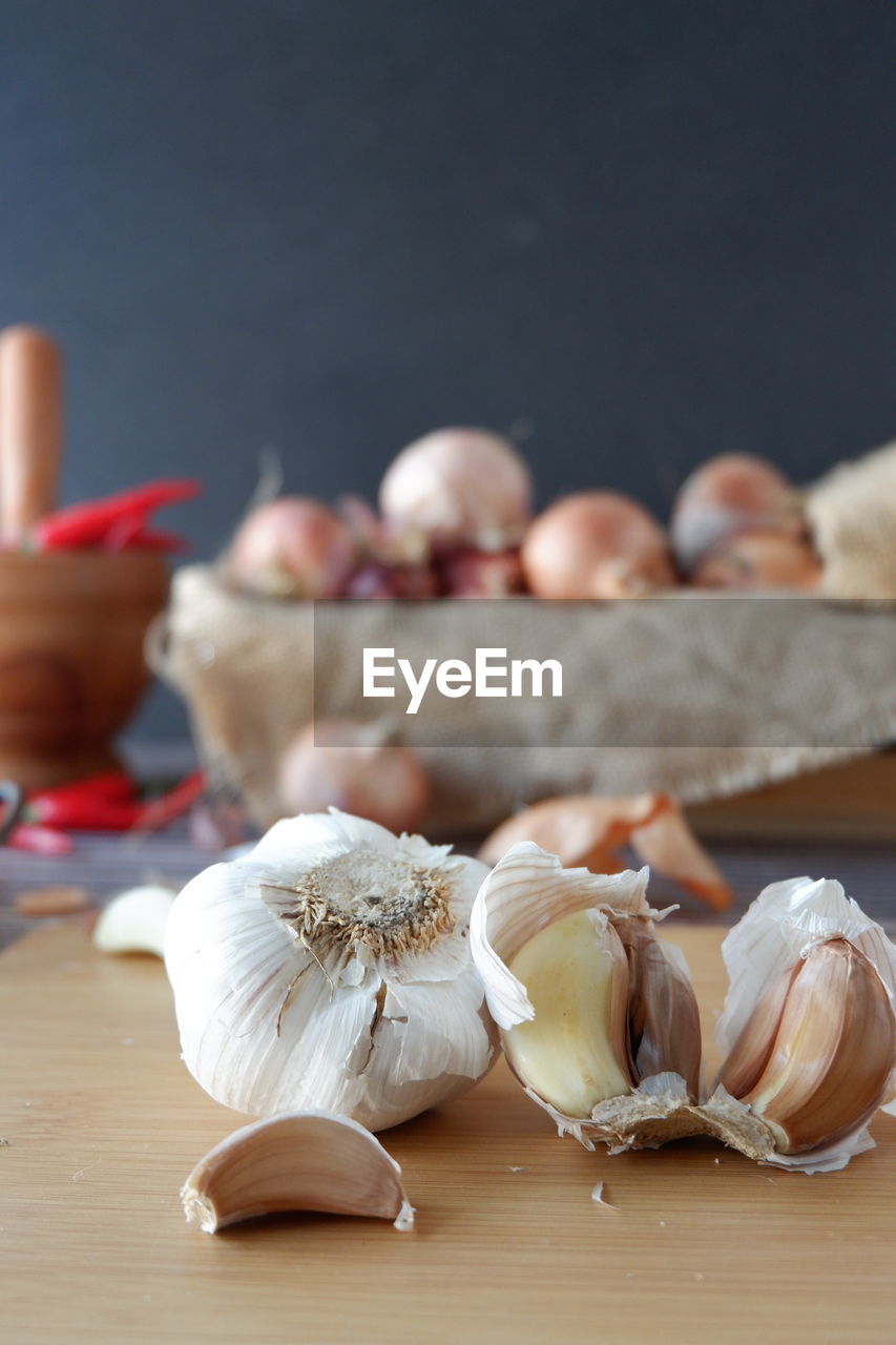 Close-up of garlic on table