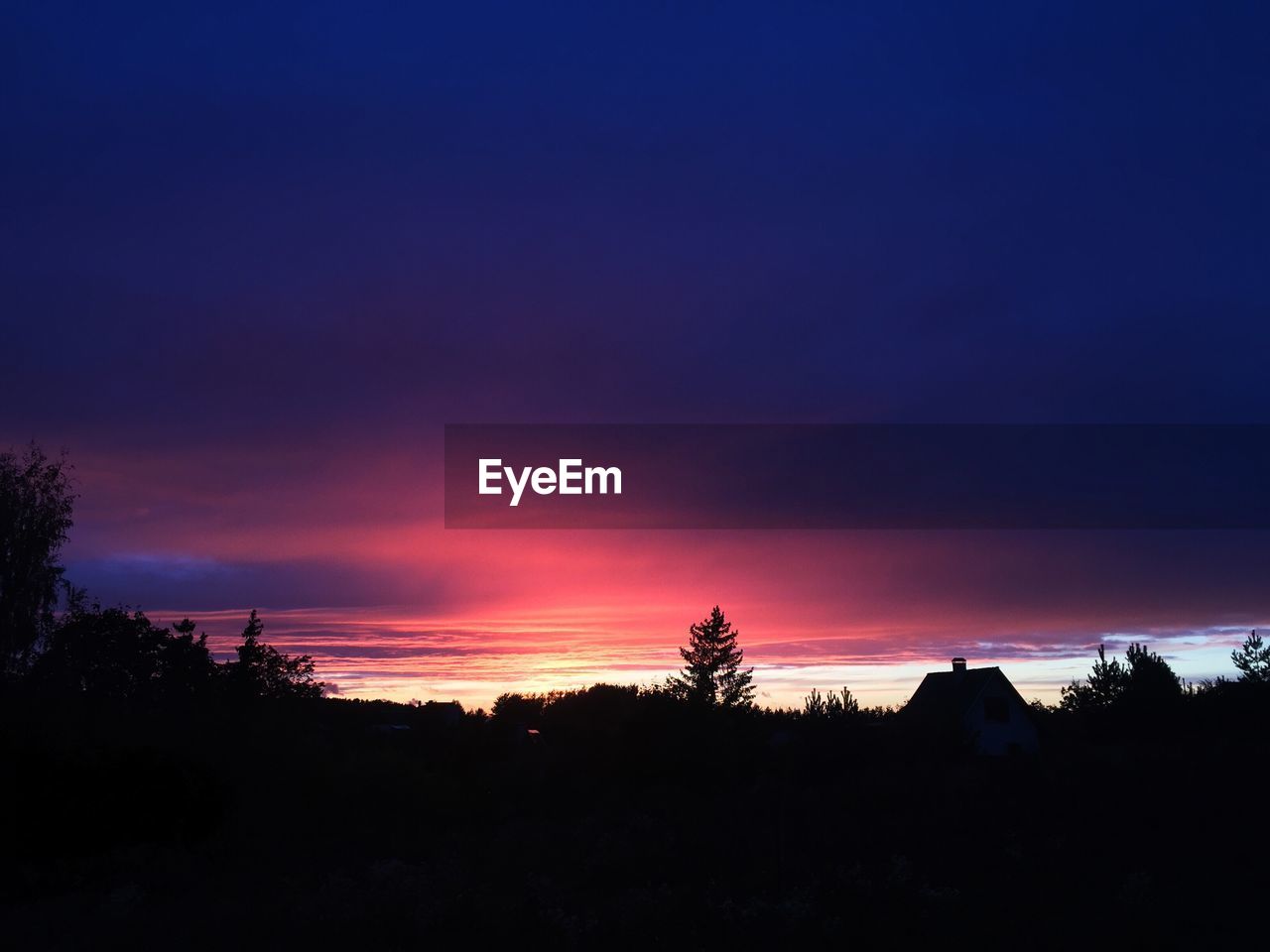 SILHOUETTE LANDSCAPE AGAINST SKY DURING SUNSET