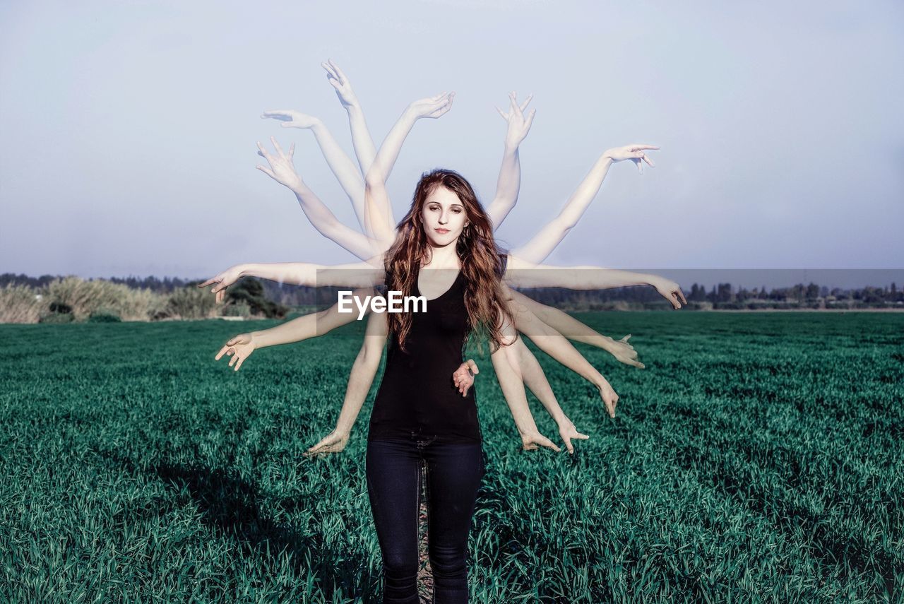 Multiple image of woman standing on field