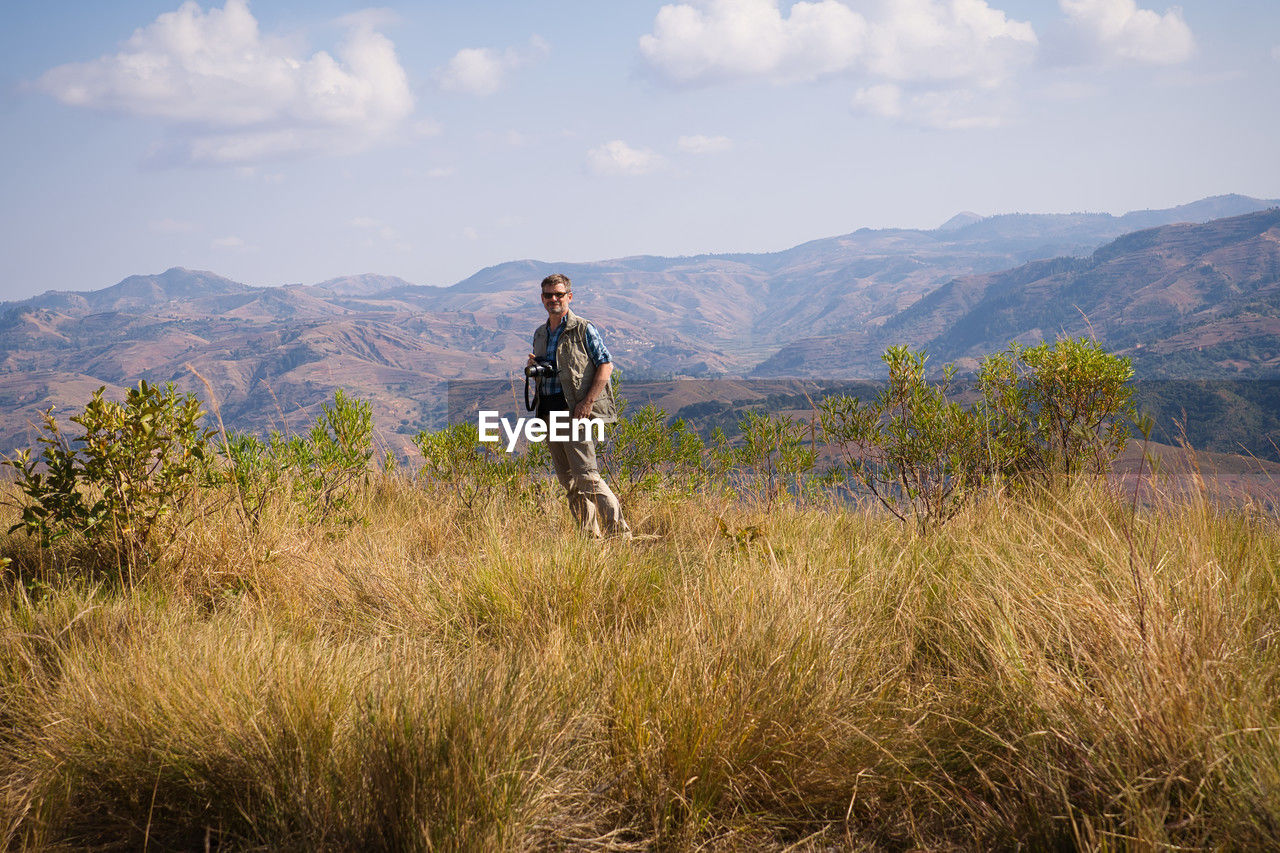 Traveller standing in a beautiful african landscape