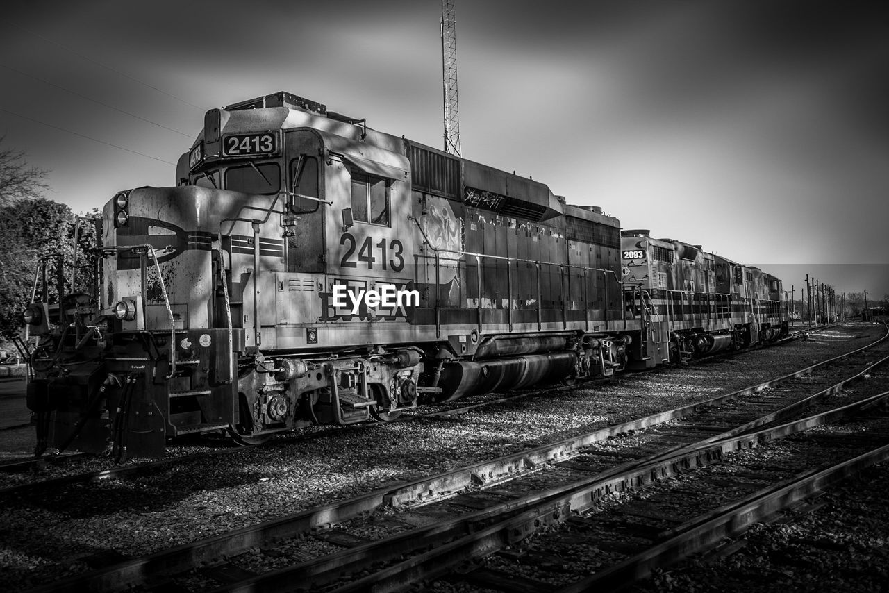 RAILROAD TRACKS AGAINST SKY