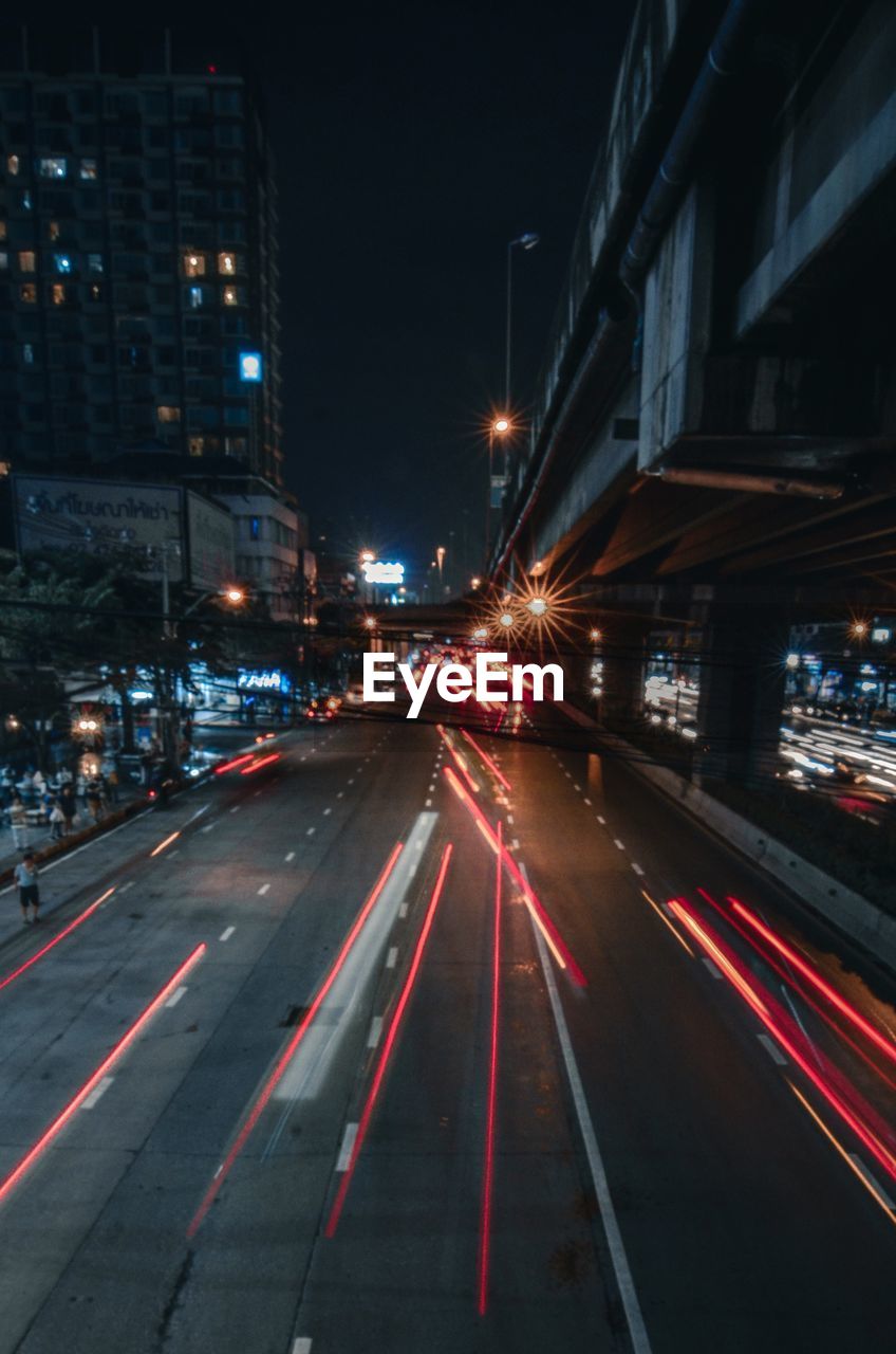 Light trails on city street at night