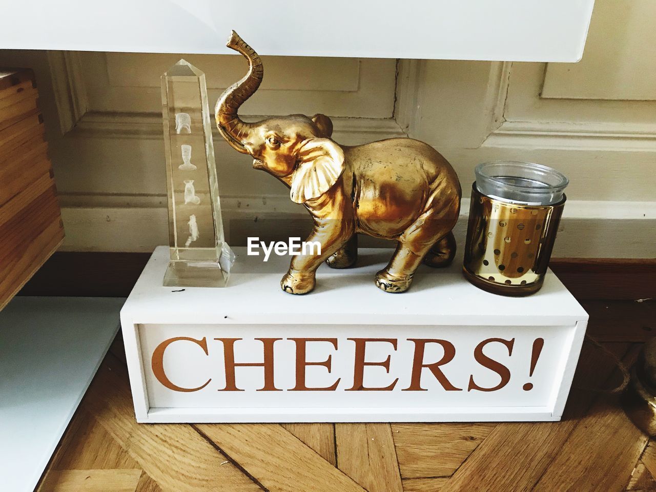 CLOSE-UP OF SCULPTURES ON TABLE AT HOME