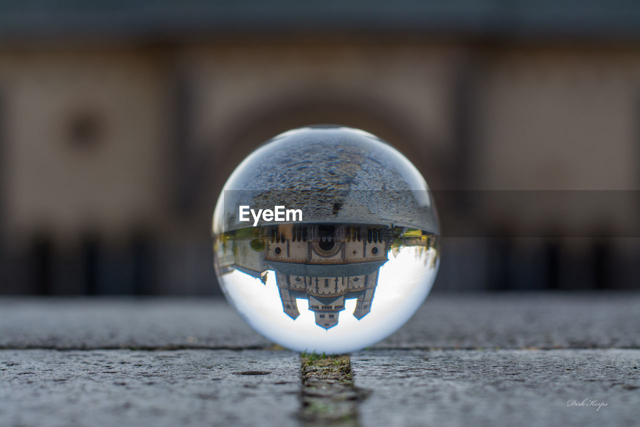 Reflection of maria laach abbey on crystal ball