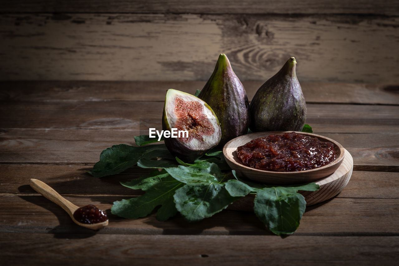 food and drink, food, wood, healthy eating, freshness, wellbeing, still life photography, rustic, indoors, studio shot, no people, plant, fruit, vegetable, produce, dark, leaf, plant part, still life, herb, common fig, spice, table, ingredient, painting, organic, plank