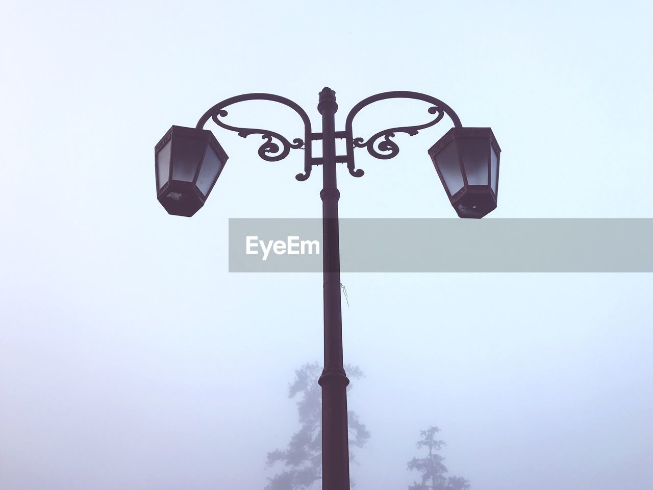 LOW ANGLE VIEW OF STREET LIGHT AGAINST SKY