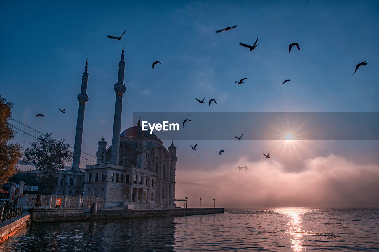 Ortakoy mosque and 15 july martyrs in foggy morning istanbul turkey 