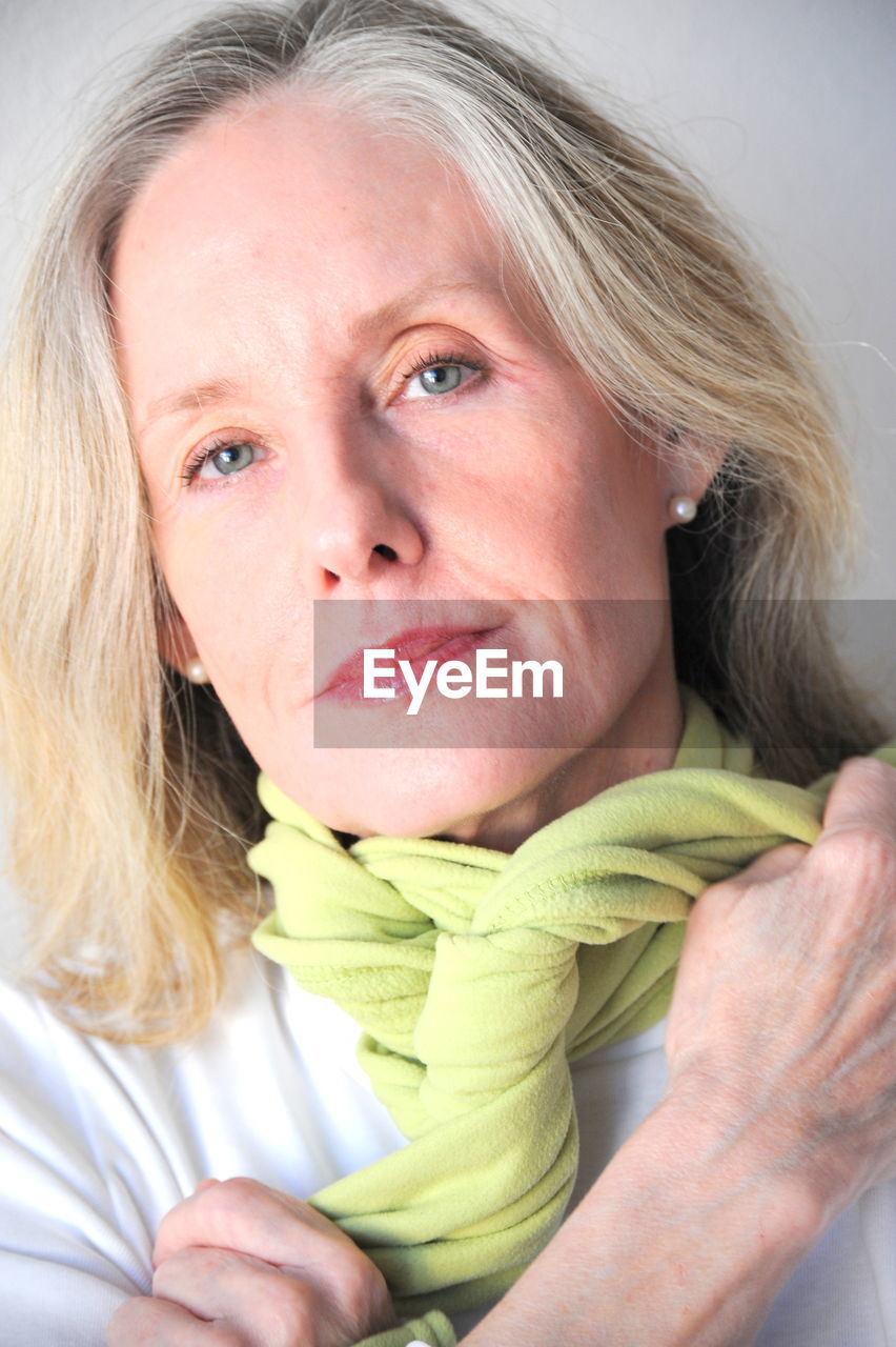 CLOSE-UP PORTRAIT OF A WOMAN WITH EYES CLOSED