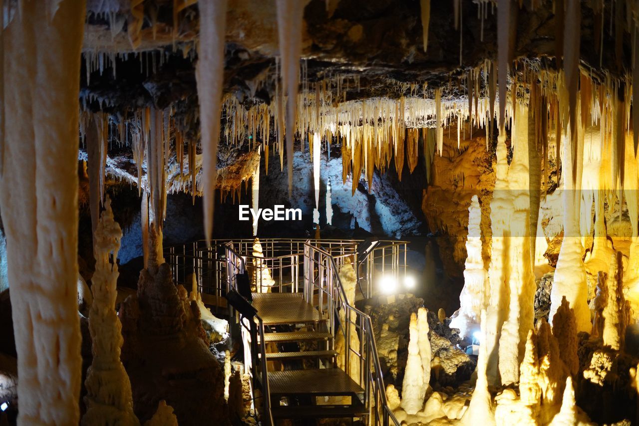 stalagmite, stalactite, cave, speleothem, illuminated, indoors, formation, no people, geology, nature, travel