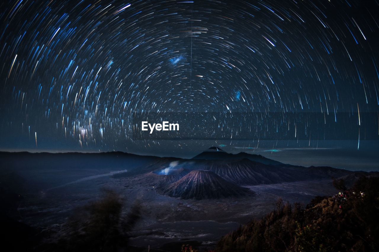 Scenic view of star field against sky at night