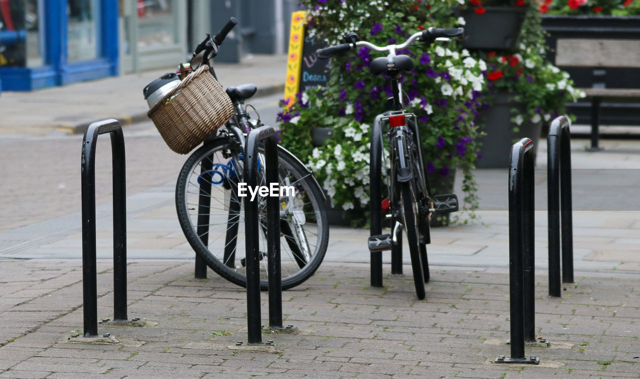 BICYCLE PARKED ON FOOTPATH