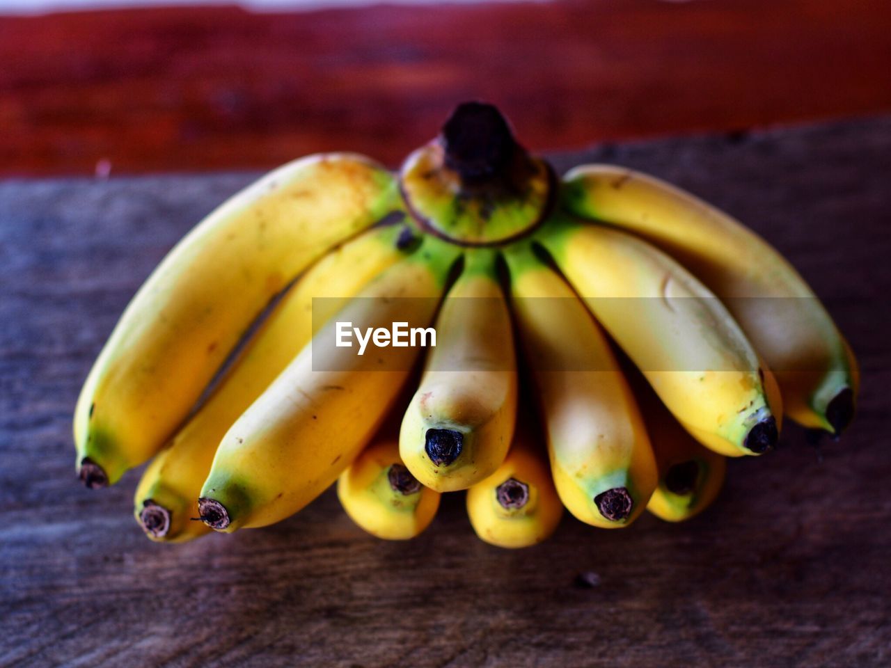 CLOSE-UP OF YELLOW FRUITS ON TABLE