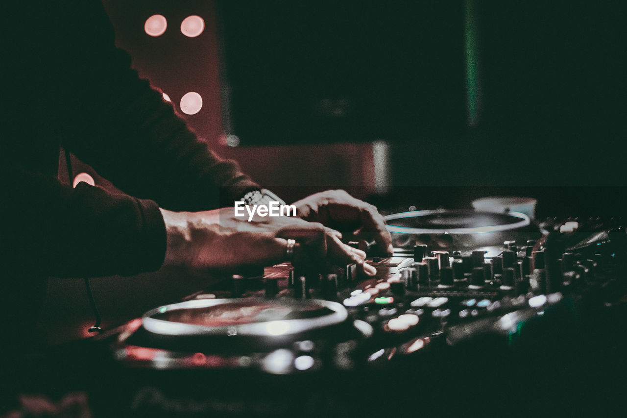 Close-up of the hands of a dj