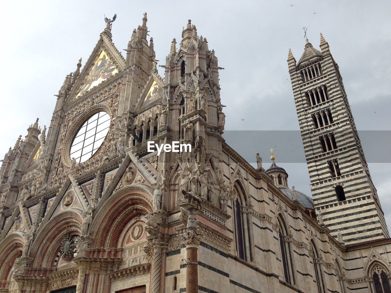 Low angle view of historical church against sky