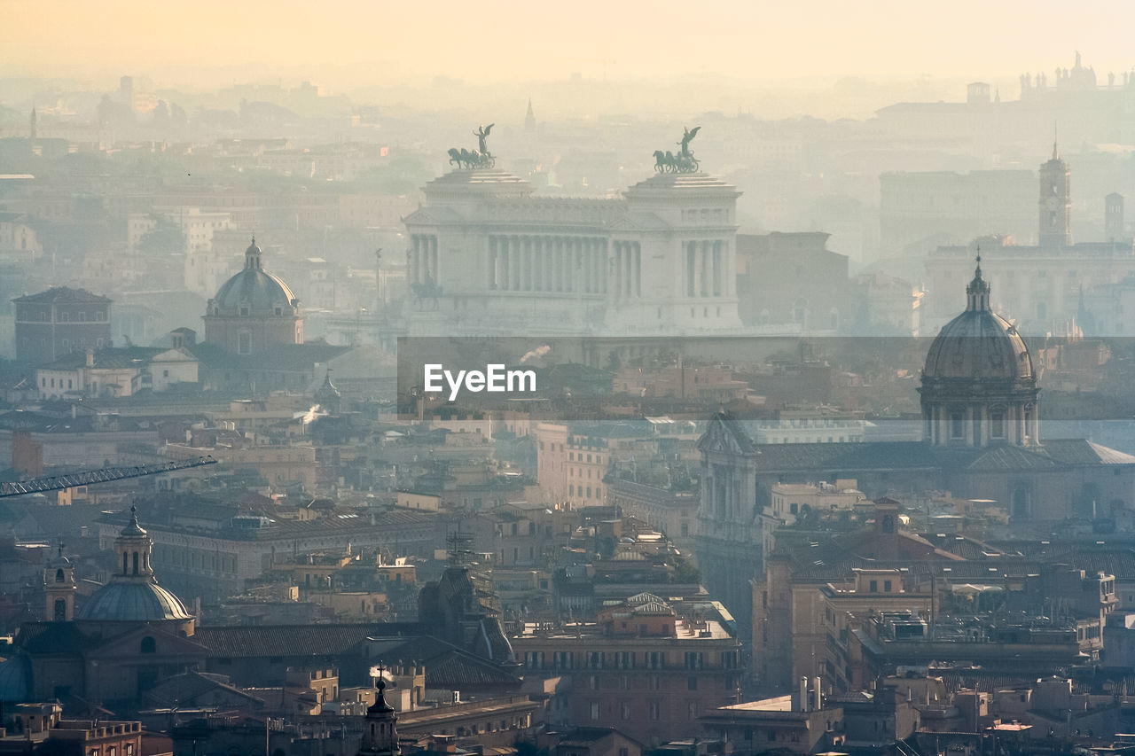 AERIAL VIEW OF CITY AT SUNSET