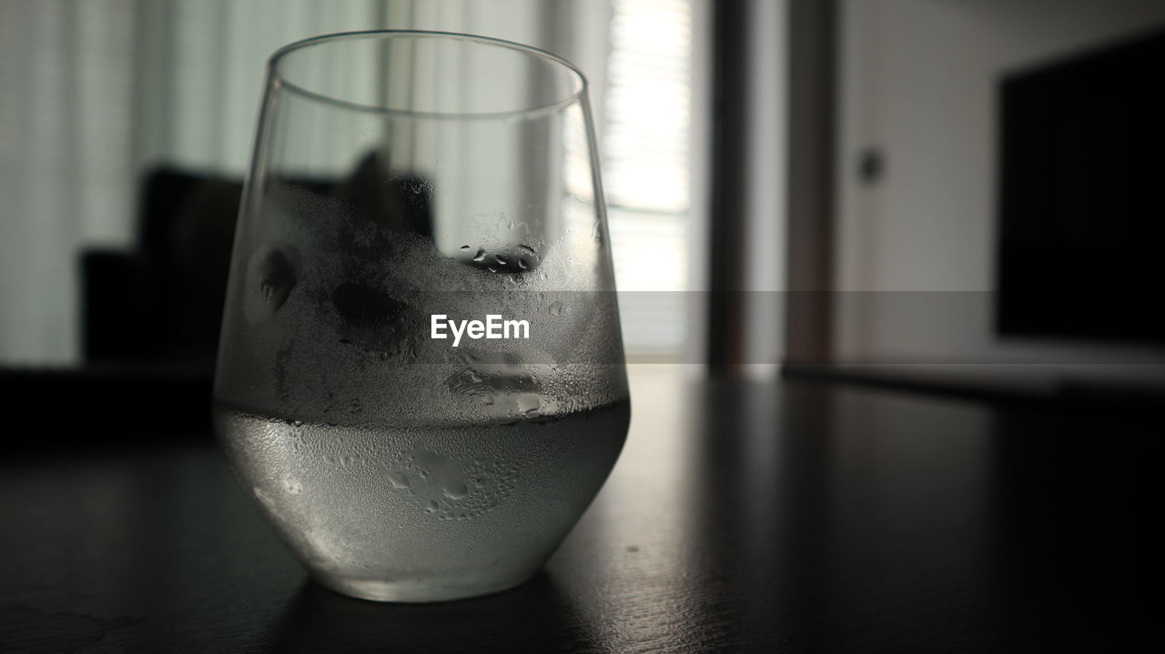 Close-up of beer glass on table