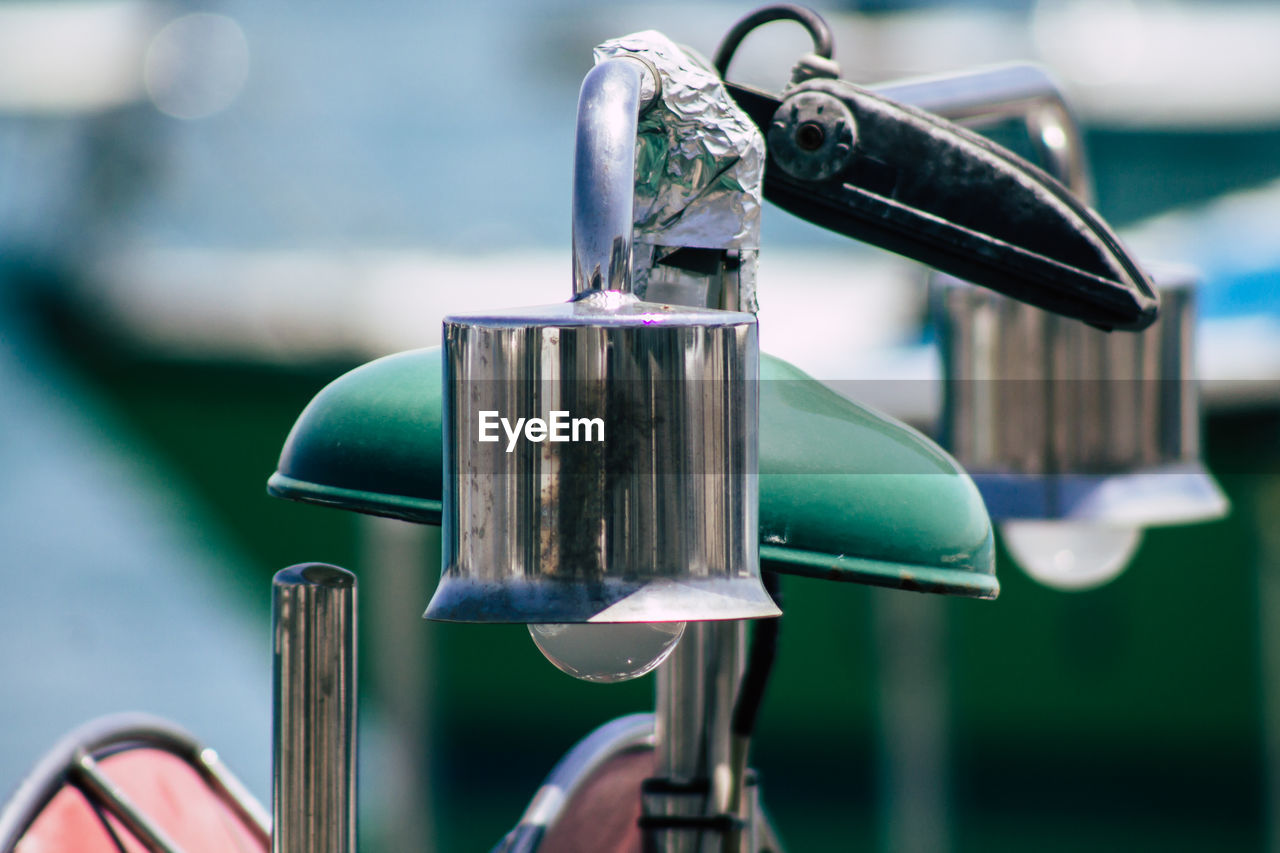 CLOSE-UP OF FAUCET ON BICYCLE