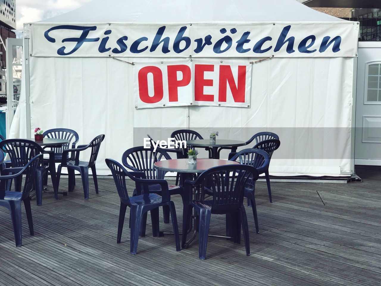 CLOSE-UP OF TEXT ON TABLE AT RESTAURANT