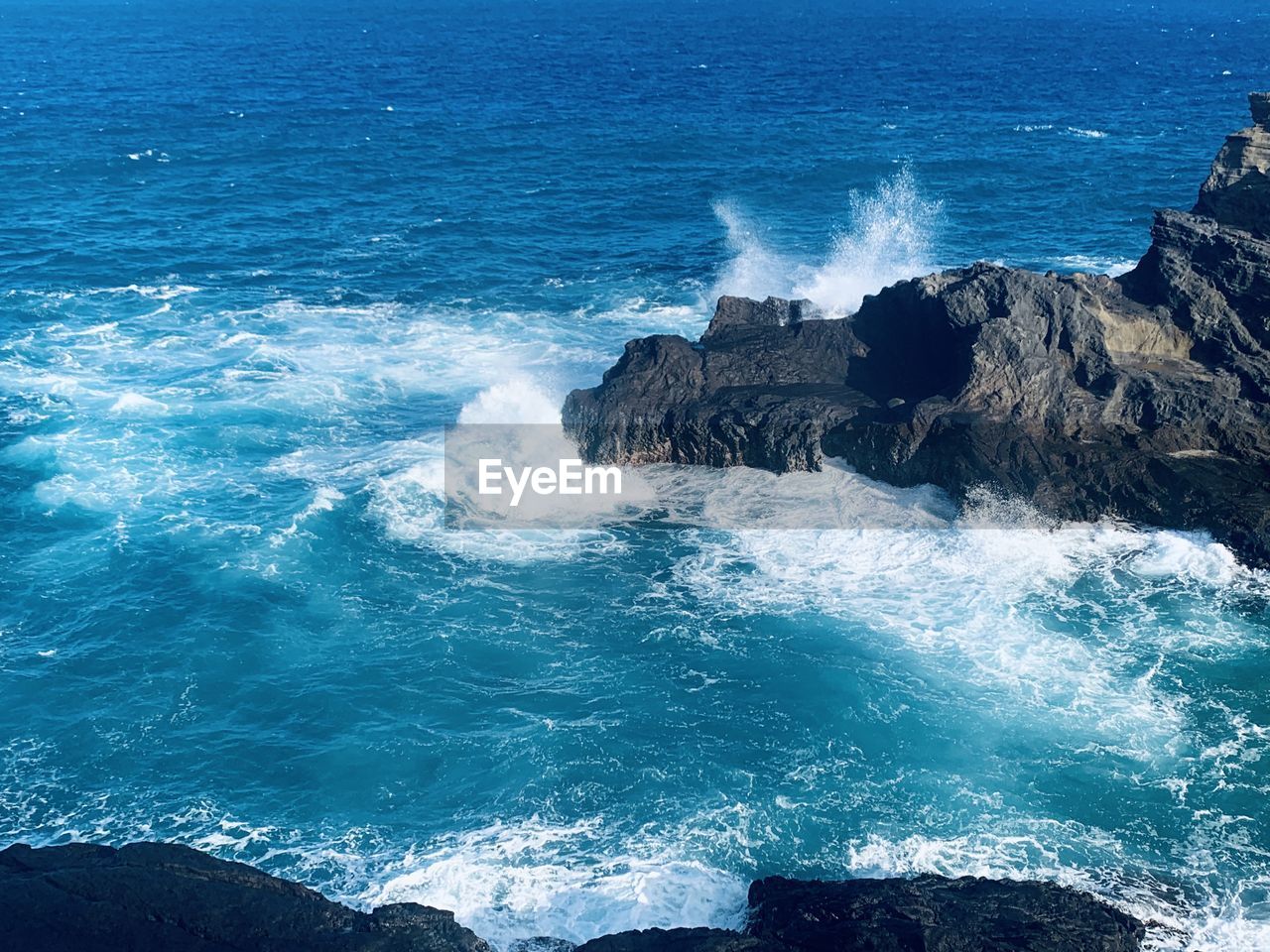 Scenic view of rocks in sea