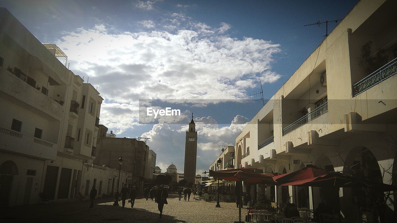 BUILDINGS IN CITY AGAINST SKY