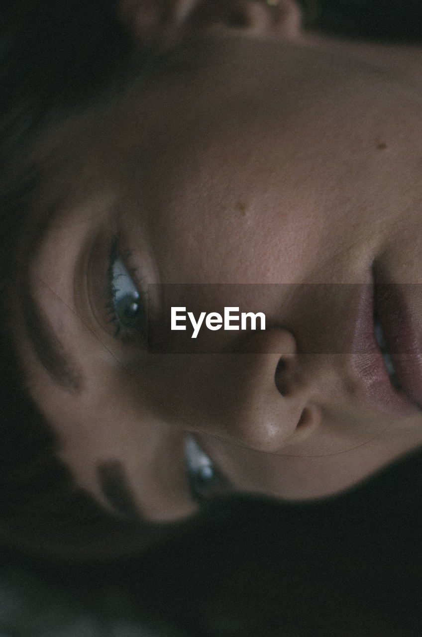 CLOSE-UP PORTRAIT OF BEAUTIFUL YOUNG WOMAN