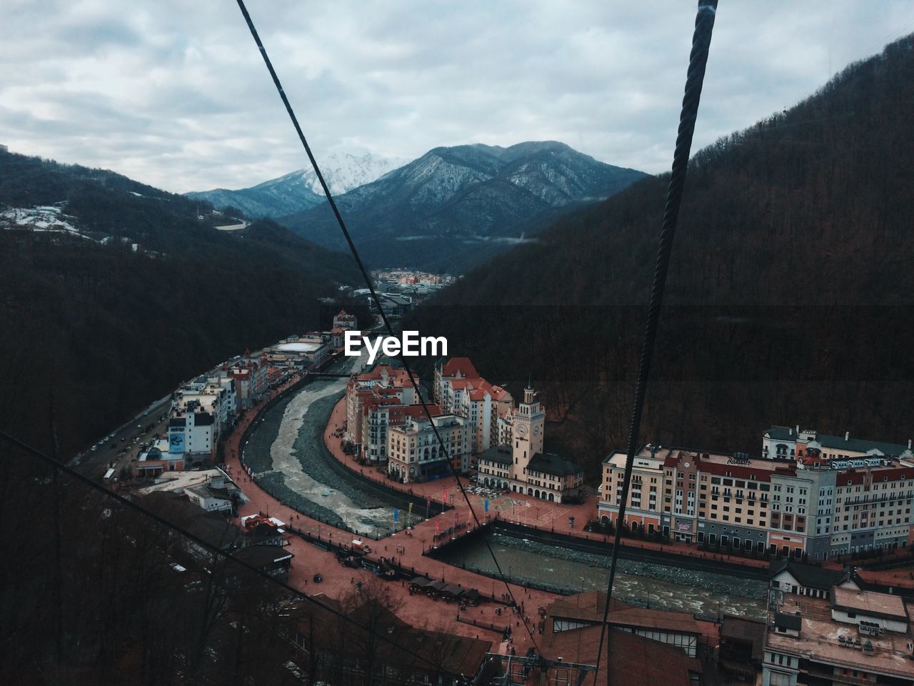 HIGH ANGLE VIEW OF ROAD AGAINST SKY