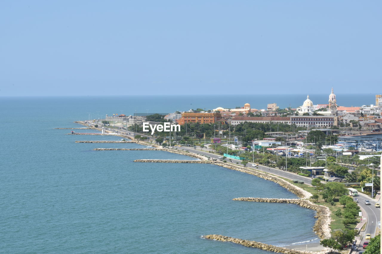 Scenic view of sea against clear blue sky