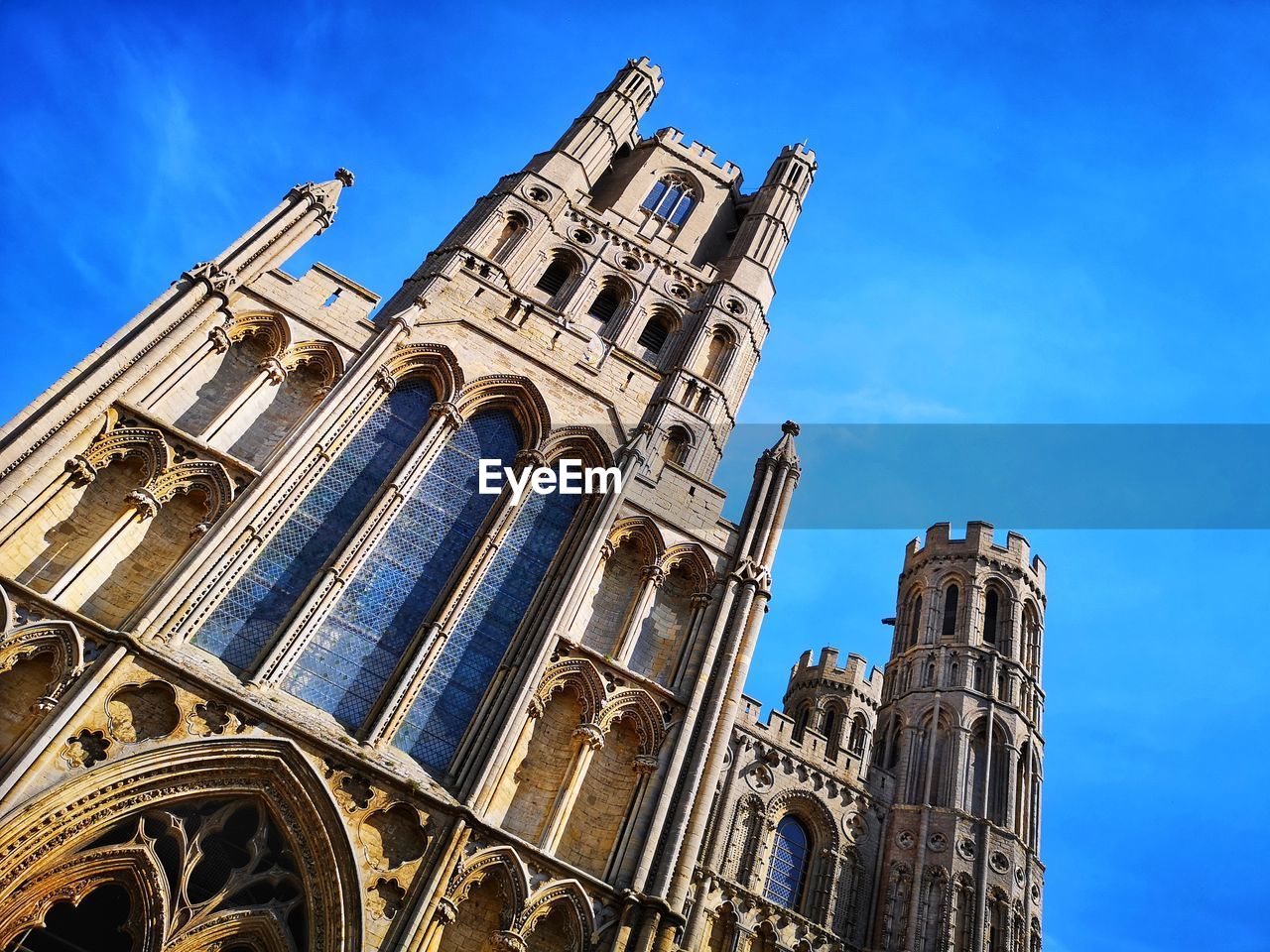 Exterior of ely cathedral with blue sky. cambridgeshire uk