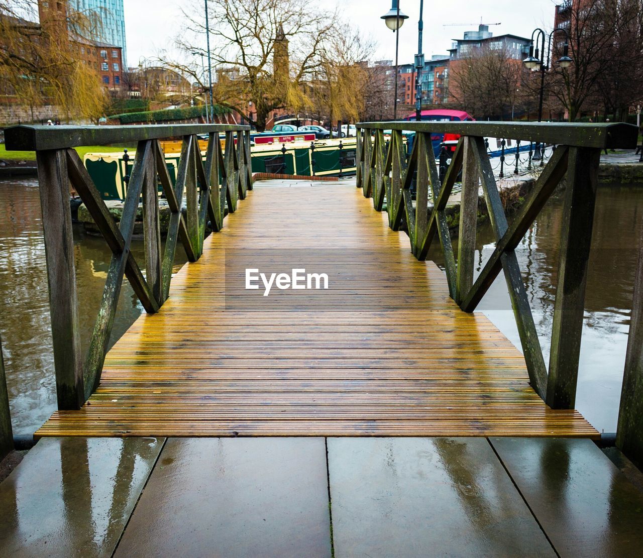 VIEW OF BRIDGE IN PARK AGAINST SKY