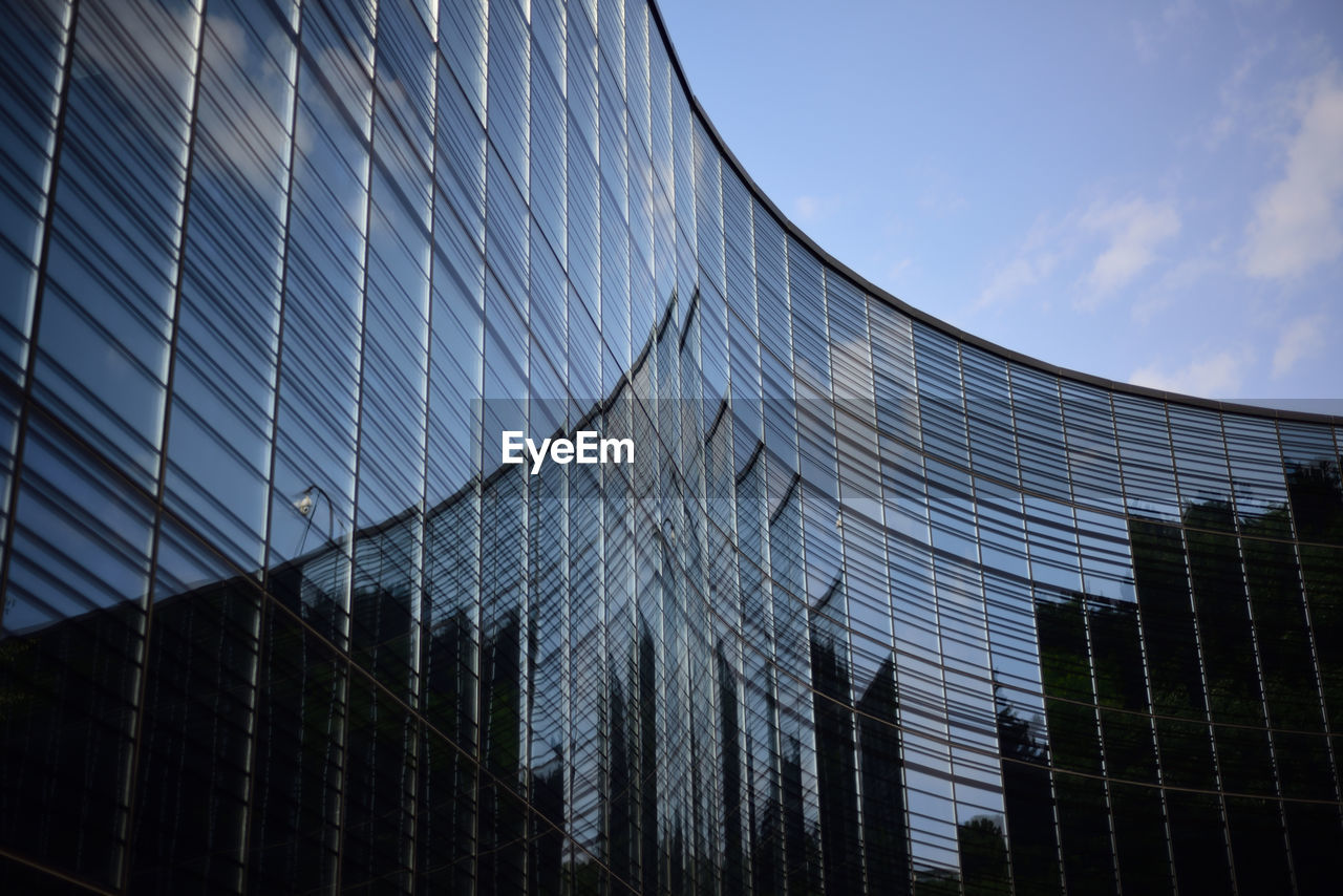 low angle view of modern building against sky