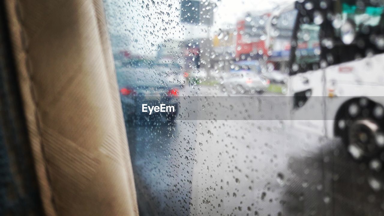 RAINDROPS ON CAR WINDOW