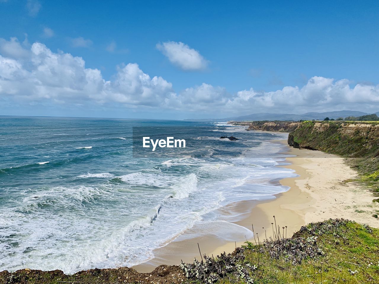 scenic view of sea against blue sky