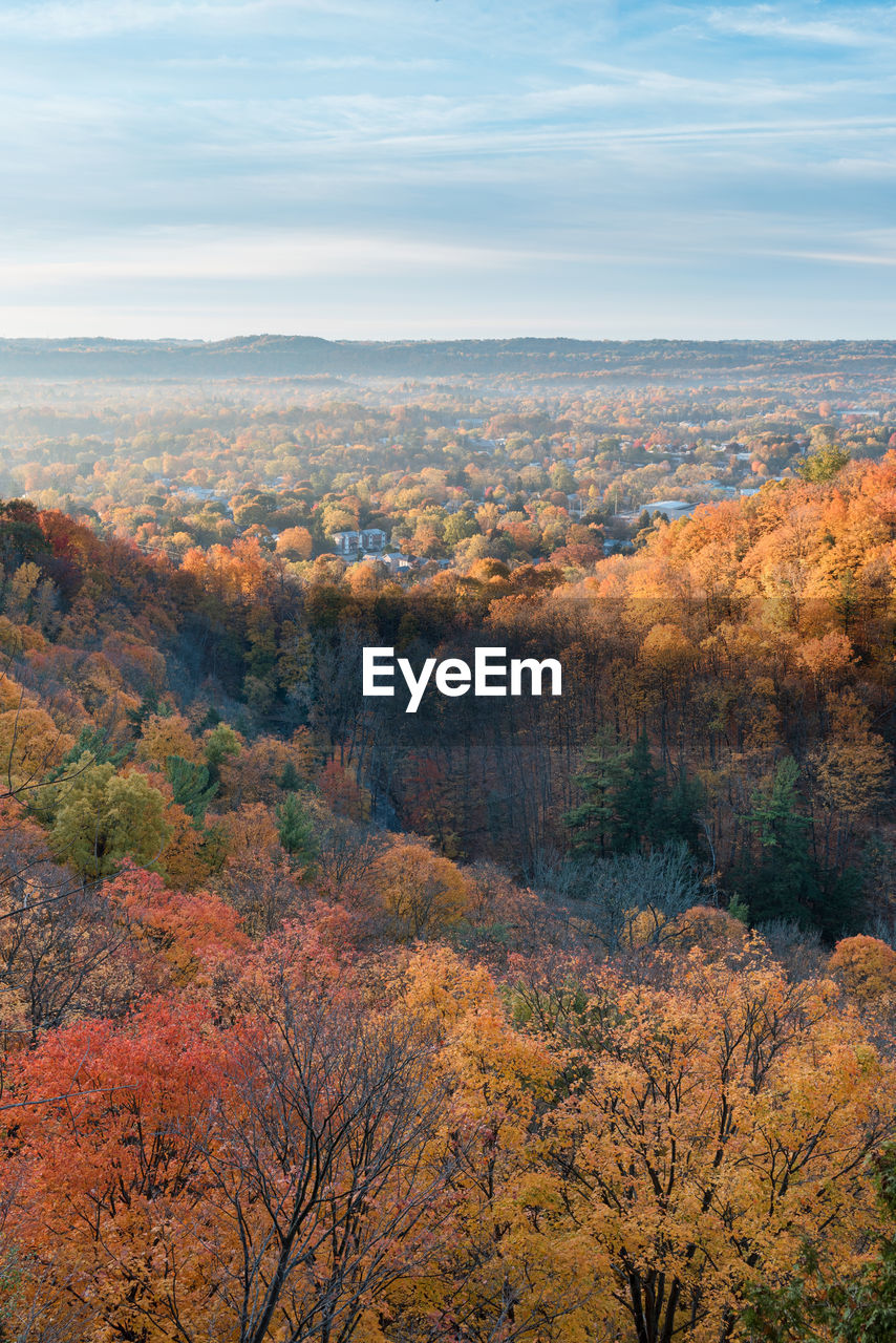 Scenic view of landscape against sky during autumn